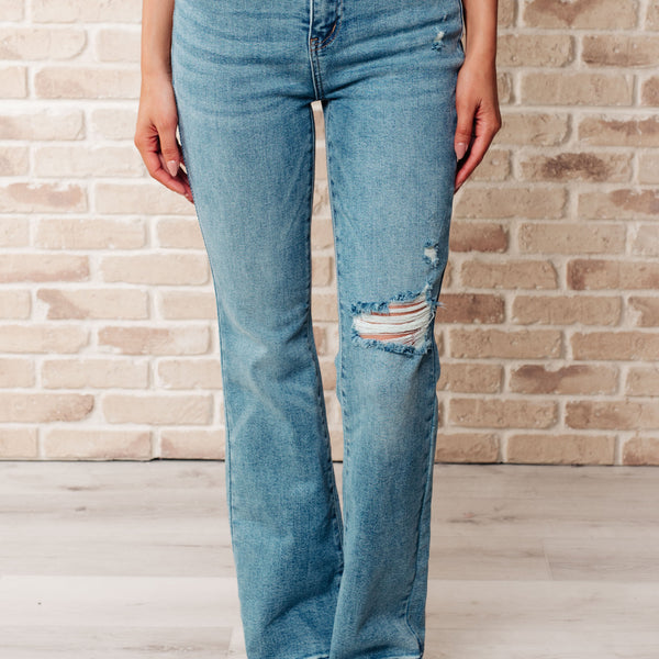 Isla Mid Rise Distressed Released Hem Bootcut Jeans